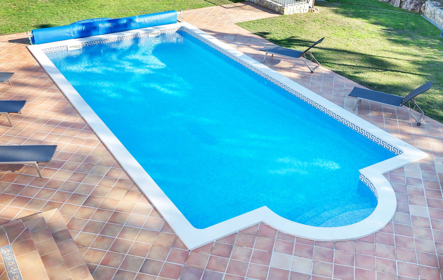 Summer pool for the holidays with a garden. For recreation and swimming.