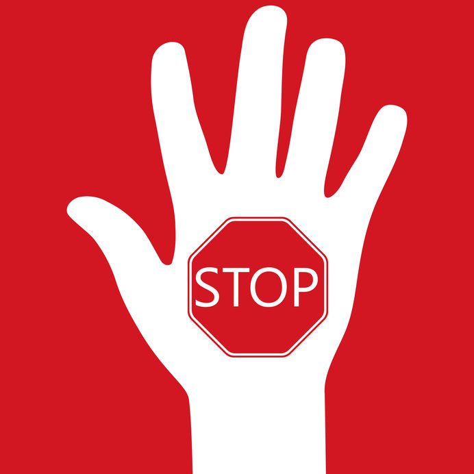 hand with a prohibition sign stop